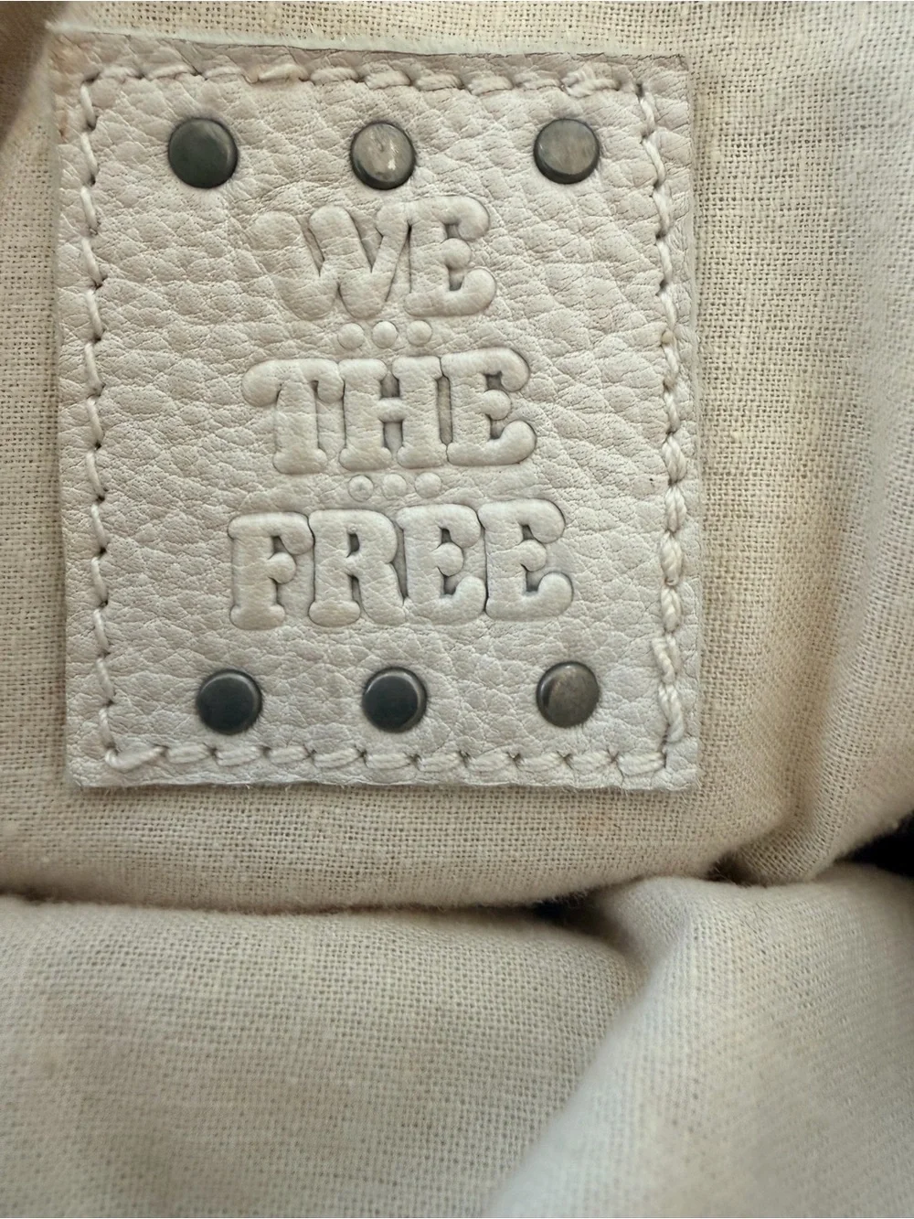 We The Free Cream Leather Sling Backpack